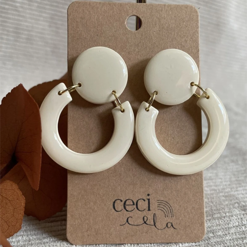 boucles doreille marcus ivoire ceci cela 1