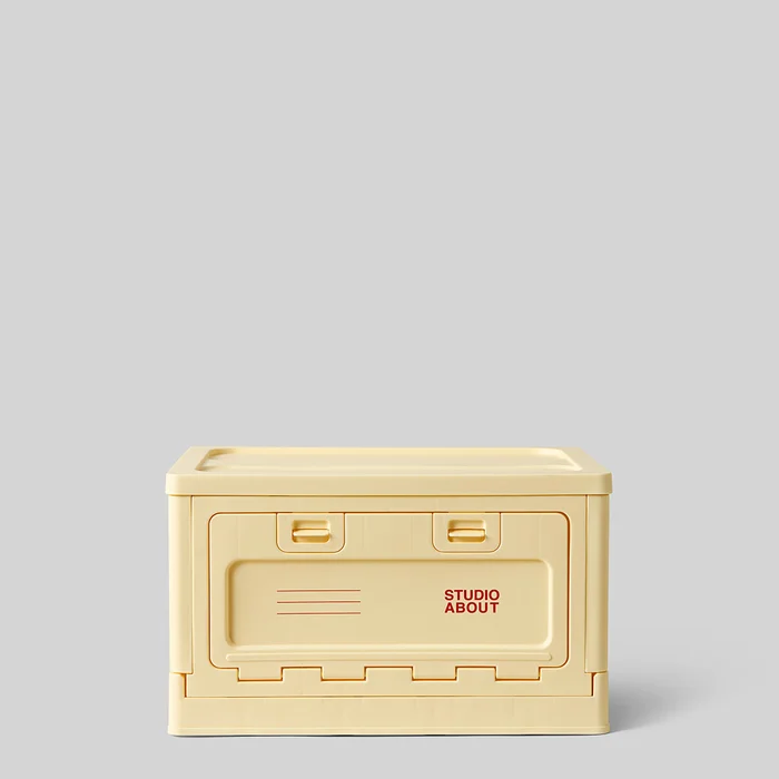boite medium jaune clair studio about maison volumes lille